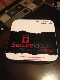 Secure Ideas Attack Machine (SIAM) with custom stickers showing port locations on top of the device