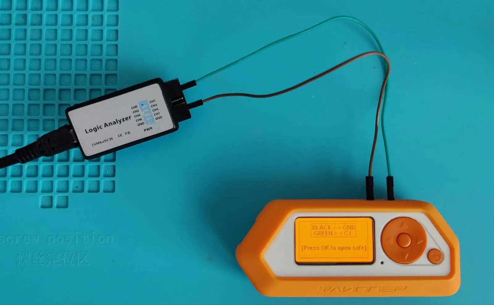 Reference photo of the logic analyzer connected to the Flipper Zero via jumper wires to conduct analysis on the Sentry Safe Exploit.