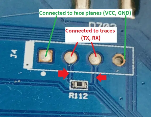 Close-up of PCB traces showing the two inner pins connecting to the nearby MCU